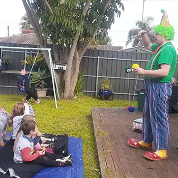Noodles The Clown performing magic